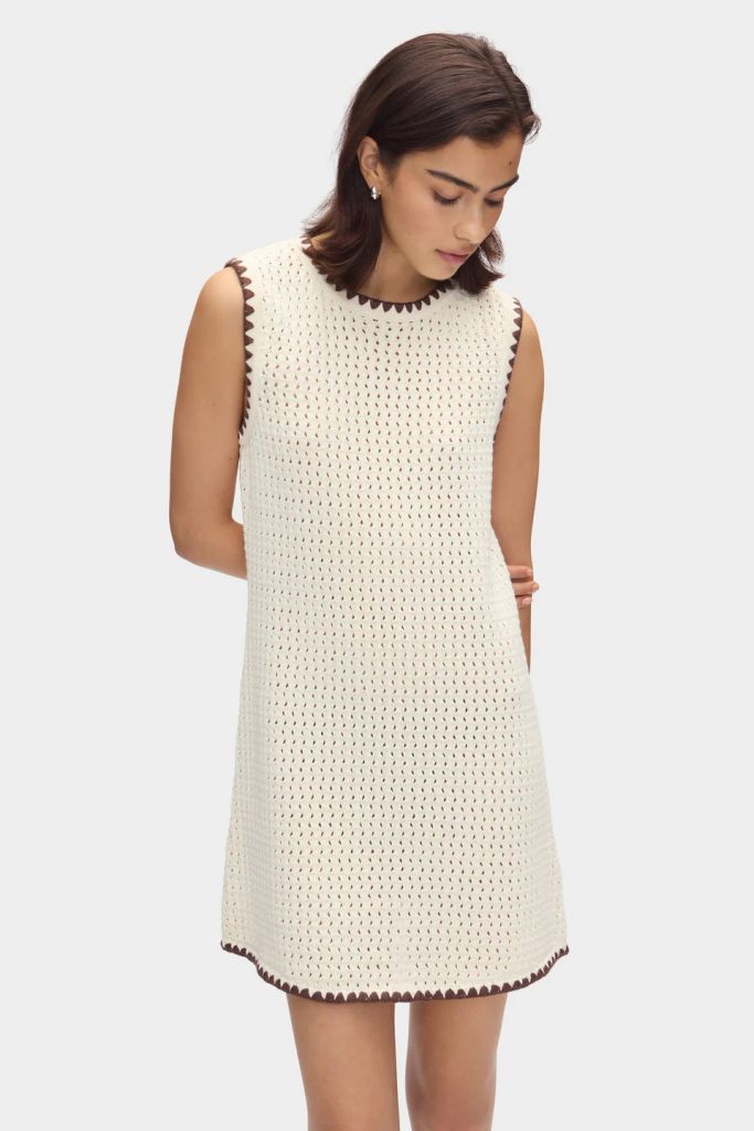 Model wears Aligne's SS25 Immy Crochet Mini Dress